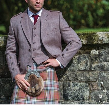 Russet-colored tweed jacket with horn-style buttons and a high-cut waistcoat with five buttons.